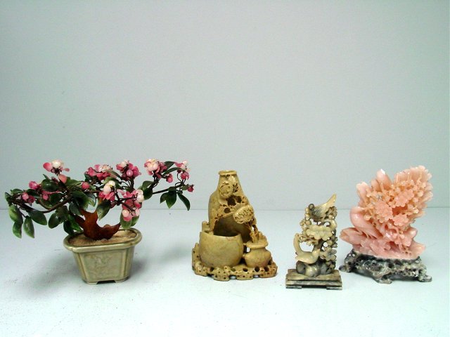 4 Chinese articles: Including: 2- Soapstone carvings,as is, "Bird" approx. 6.5" H, "Urn of Flowers" approx. 8" H. 1- Pink quartz carving of "Bird & Flowers", chip on top, approx. 8.5" x 6.25". 1- Jade & quartz "Tree", ap