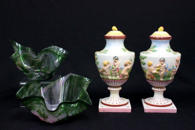 Group lot of assorted smalls: 1- Pair Venetian glass handblown bowls napkin fold, approx. 10" x 7". 1- Pair Capodimonte covered urns, depicting "Cherubs", approx. 13" H. Lid repaired, flake on base.