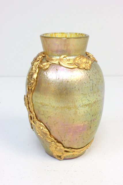 Antique Loetz vase with gilt metal mounts: Unsigned. Approx. 6" H.