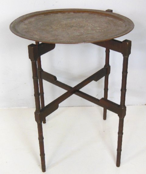 Islamic brass top table: With fold out base. Approx. 33" H x 26" Diam.