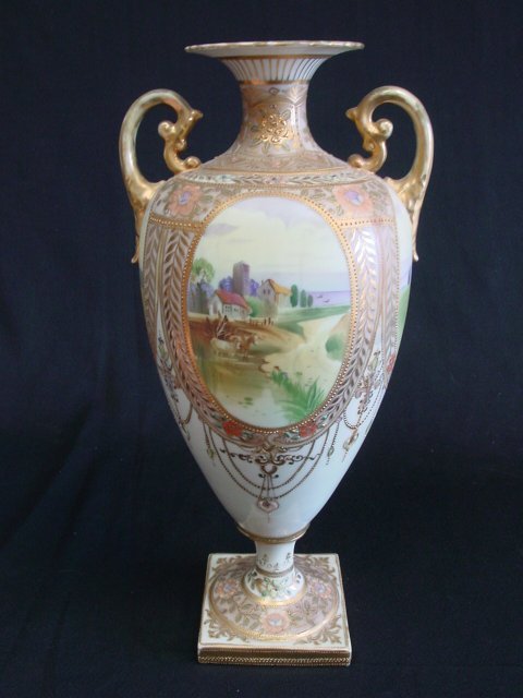 Nippon vase: With "Landscape Scenes with Houses". Approx. 16" H x 8" W.
