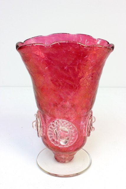 Blenko glass cranberry vase: With clear applique. Blenko glass was sold to the Rainbow glass Co., a competitor at the time, Rainbow Glass Co. then flashed this vase with the cranberry color. The Blenko I.D. # for this vase would 
