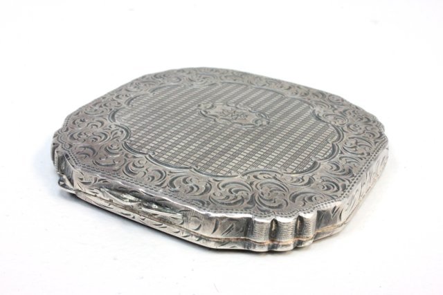 Silver compact: Approx. 3 1/8" x 3 1/8".