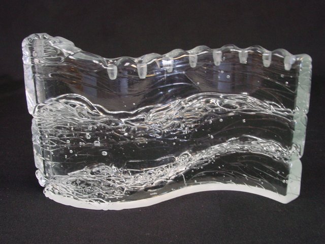 Unusual serpentine Judaica glass menorah: Approx. 11" W x 7.5" H.