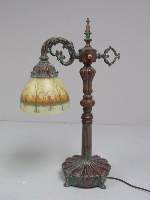 Old bronze patina white metal bridge lamp: With handpainted shade. Approx. 20.75" H x 11" W.