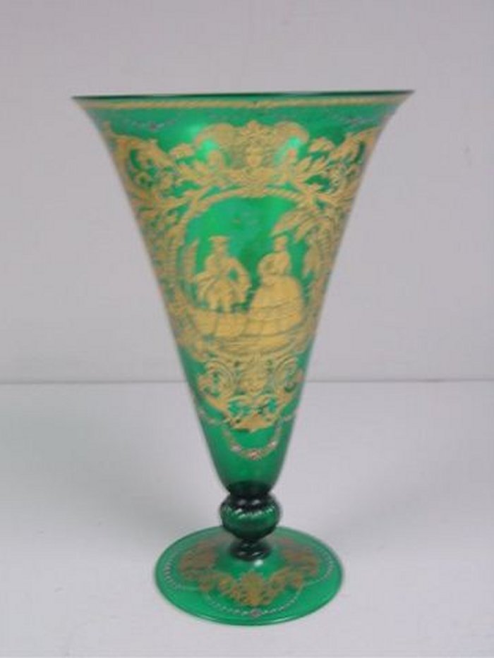 Green blown glass vase: With gold enamel, depicting "French Courting Scene & Mythological Faces". Approx. 15" H. From the Riverdale, NY estate of Nell Martinis.