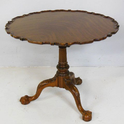 Pie crust tilt top table: Philadelphia ball & claw bird cage, made by Kindel Furniture Co., surface scratches. Approx. 30.5" x 34.5" Diam.