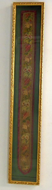19th c. gilt framed "Floral" needlepoint: Under glass, tattered condition. Tapestry approx. 56" H x 5", 64" x 10.5" with frame.