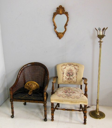 Group lot of assorted furniture: Including: 1- Needlepoint arm chair. 1- Cane back leather cushioned desk chair. 1- Brass floor lamp. 1- Gilt framed mirror. 1- Giltwood sconce.