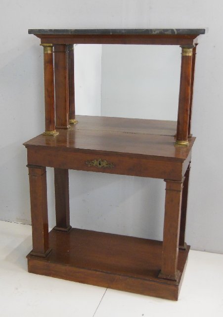 Empire style Pier table/secretary ca. 1900: Mahogany with bronze mounted capitols, pull out drawer with lift up writing desk, gold leather tooled. Approx. 50" H x 15.75" writing surface, black marble top 33" W x18" D..
