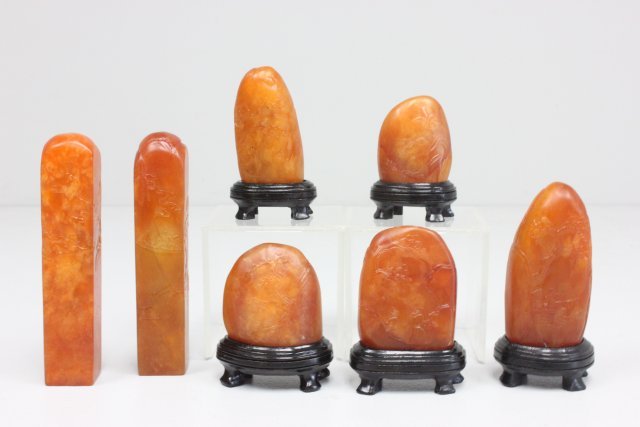 7 soapstone pieces: All with stands, various sizes.