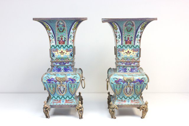 Pair Chinese cloisonne urns with figural legs: Approx. 14" square x 28" H.