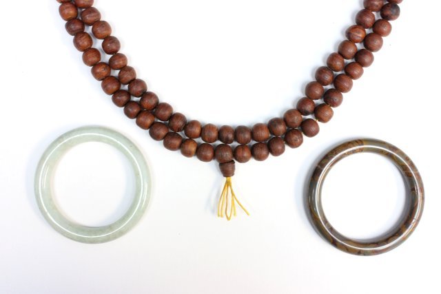 Chinese beaded necklace & 2 stone bracelets: Beaded necklace from Buddha tree "Good Luck". Approx. 24" Long. 2 Stone bracelets. Approx. 3" Diam.