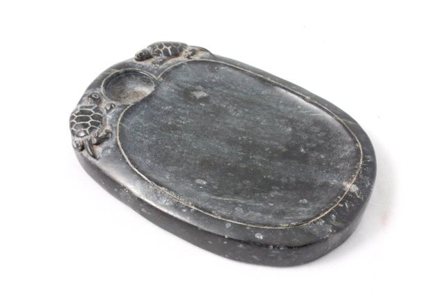 Chinese inkstone with carved "Turtles": Approx. 4" x 2.75".