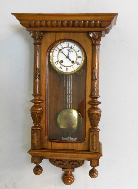 Gustav Becker walnut wall clock: Crown missing. Crack in wood on facing.