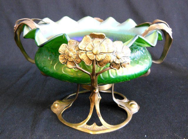 Bronze mounted green art glass compote: Possibly Loetz. Approx. 7" H x 11.5" W.
