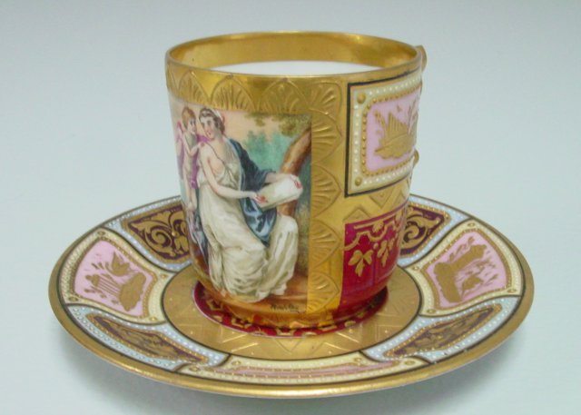 Vienna porcelain cup & saucer: Signed, raised gilded Vienna beehive mark, depicting "Venus U Amor".