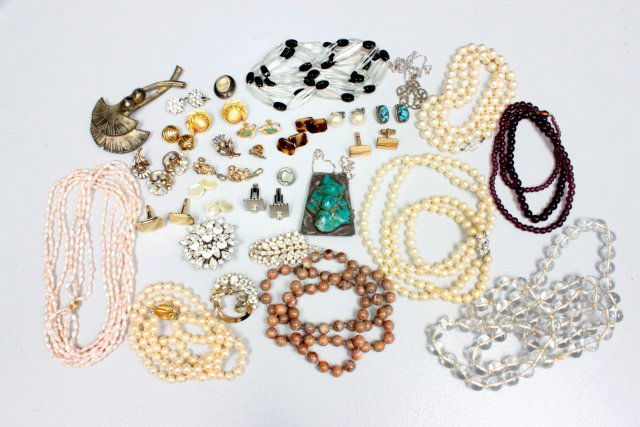 Lot of costume jewelry: Comprising of: Various pieces of Trifari, Marvella turquoise and silver necklace and child locket. Provenance: From the collection of Nina Starkey, Ziegfeld Follies dancer.