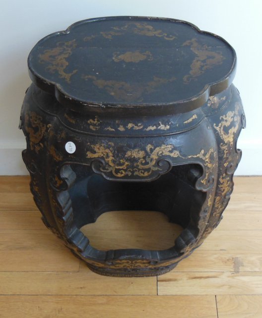 Chinese gilt decorated Tete de Negre garden stool: 19th c. lacquered garden stool. Approx. 19" X 16". Provenance: Purchased from Edward Garrett, NYC.