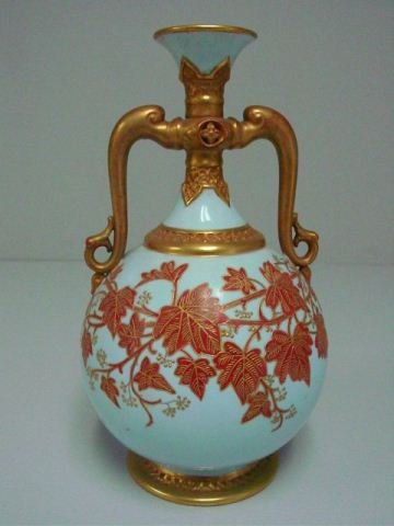 Royal Worcester Robin's egg blue urn: With gilt decoration. "Foliate" design, green mark. Approx. 11" H. X 6.75" W.