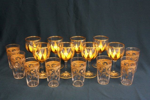 2 sets of 8 gold & crystal juice & wine glasses: Ca. 1900.