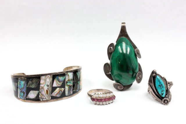 Group lot of sterling silver jewelry: Including: 1- Sterling & abalone Mexican cuff bracelet. 1- Sterling & turquoise ring. 1- Malachite pendant. 1- Silver ring with 37 rows of stones.