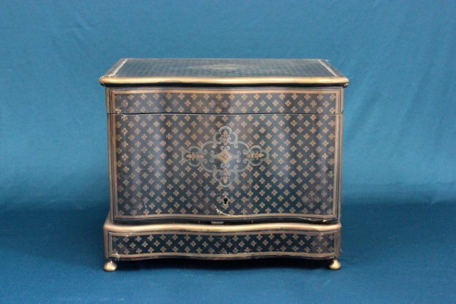 Late 19th c. French Boulle ebonized tantalus set: Signed on lock "Tahan - Paris", bottles & glasses gilt decorated, missing 5 glasses. Approx. 11" H x 13.5" W.