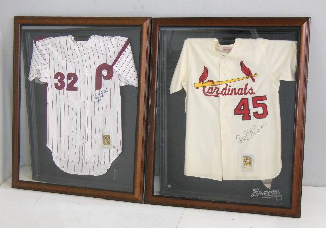 2 framed signed baseball jerseys: Signed by Steve Carlton & Bob Gibson.