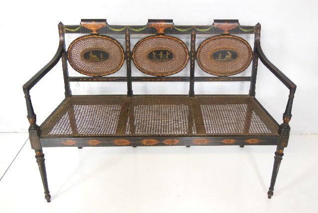Adam's paint decorated settee with cane seat &back: Classical painting with "Putti". Approx. 47.75" x 18.5" D x 33.75" H.