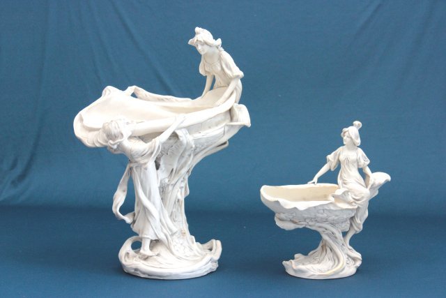2 Art nouveau Royal Dux figural centerpieces: Approx. 18" H x 13" W x 8.5" D & 11" H x 10" W x 5.5" D.