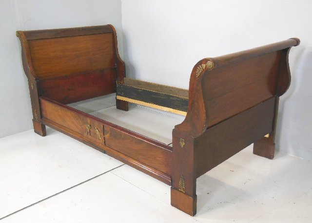 19th c. French Empire bronze mounted day bed: Approx. 38" h x 42.5" D. From the Chateau des Thon, which originally was built and located outside of Dijon, France in the early 18th century.