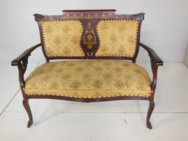 Cherrywood handpainted settee ca. 1930's: With yellow upholstery, "Floral" decoration, wear in upholstery. Approx. 38" H x 45.5" L x 21" D.