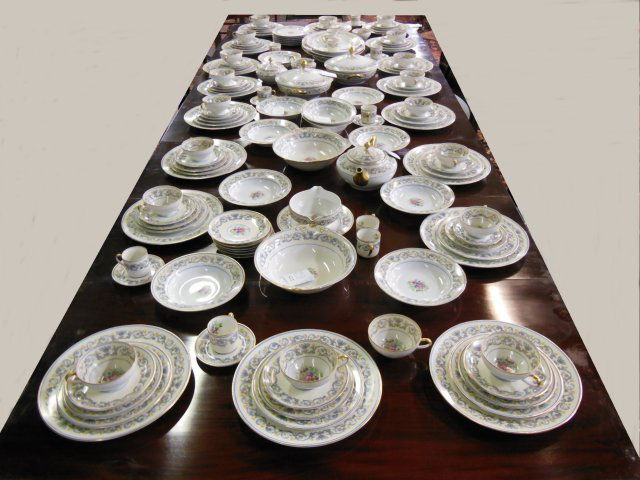 Limoges dinnerware set Charles Ahrenfeldt, France: Consisting of: 18- Dinner plates (1 chipped). 9- Soup bowls (1 Chipped). 24- Cake plates. 13- Bread & butter dishes ( 1 chipped). 24- Saucers. 21- Coffee cups. 12- Demitasse cups. 12- Saucers. 1- Teap