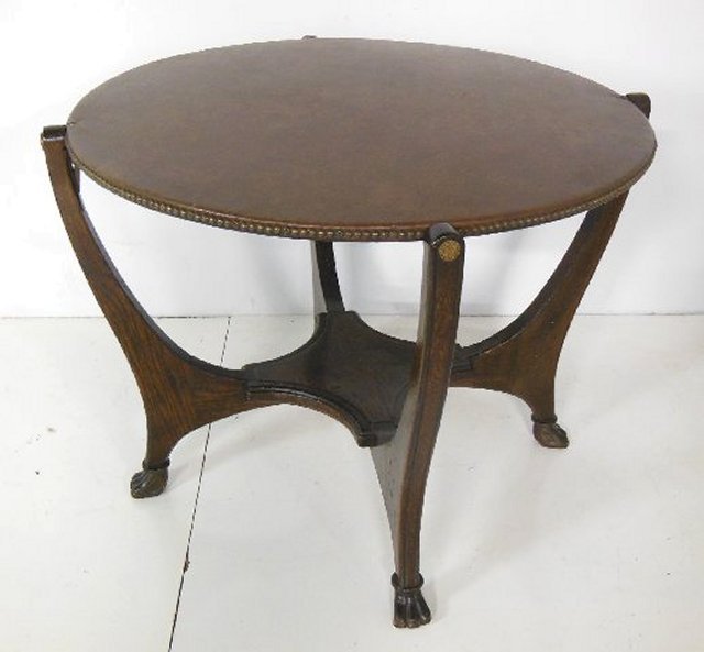 Oak Hunzinger game table with paw feet and leather: Some wood missing.