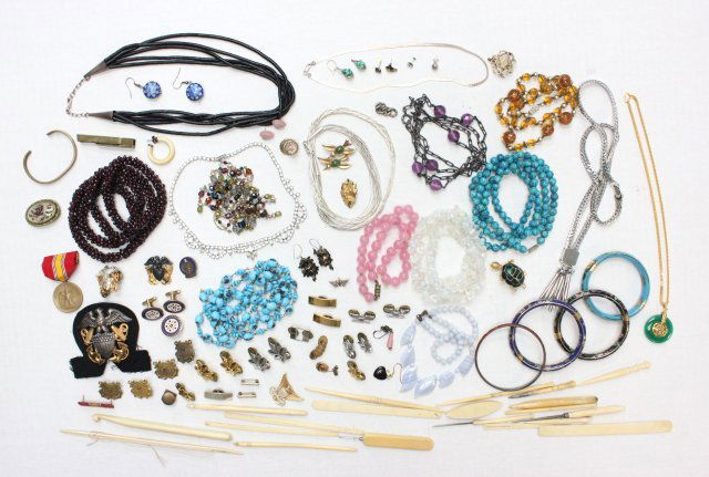 Lot of Costume jewelry: Including: Trifari, Monet, enameled bracelets, sewing tools, medals and sterling necklace