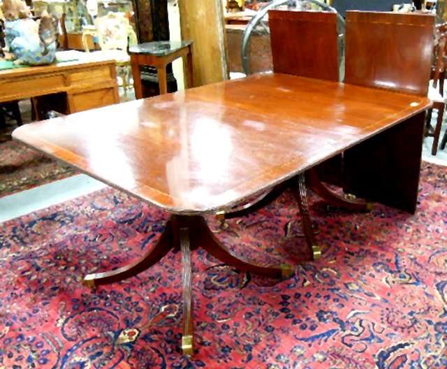 Baker Charlestown mahogany dining room table: Double pedestal banded table. With 2 boards.