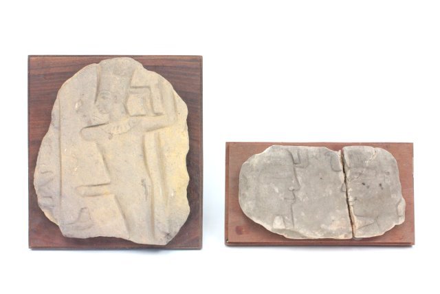 2 Egyptian stone fragments: Mounted on wood fragments. Approx. 9" x 5" & 10" x 8.5". Collection of Middle Eastern antiquities from a Long Island, NY collection. All property from the Field Estate in East Hampton, NY. All antiqui