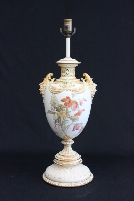 Royal Worcester vase: Mounted as a lamp, with mask head handles & "Floral" decoration. Vase aprrox. 16" H, 19" H with base. (3224)