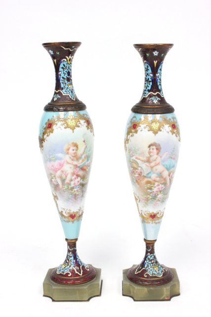 Pair light blue & enameled Sevres vases: With "Putti". Artist signed. Champleve with onyx bases. 11" high.