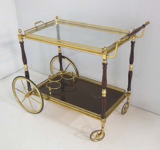 Bronze & glass tea cart: Very unusual with bronze finials. Approx. 25.5" H x 15" W x 30.5" L.