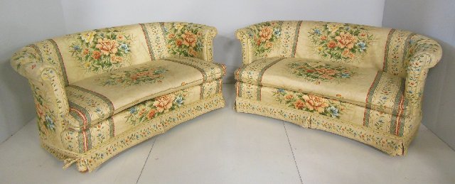 Pair upholstered loveseats: Floral upholstery. Approx. 58" W x 33" D x 31" H.