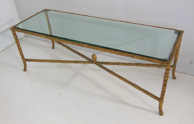 Mid century glass top bronze coffee table: With 1" thick glass. Approx. 17" x 17" H x 48" across.