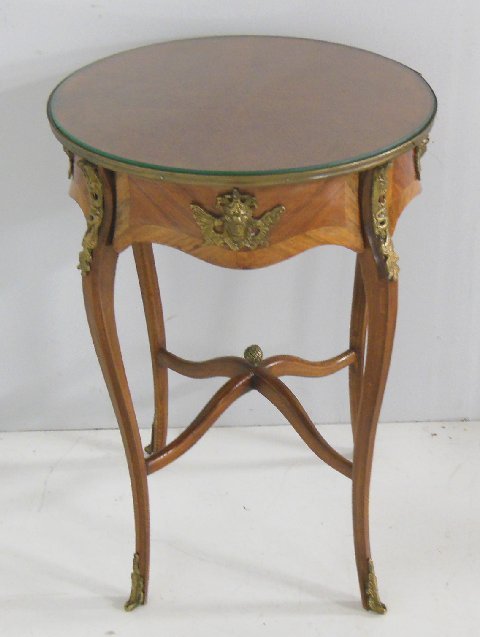 Round French style bronze mounted lamp table: Approx. 20.25" x 29.5" H.
