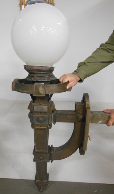 Bronze outdoor light fixture ca. 19th c.: With white glass globe. approx. 49" H x 11.5" W x 17" D.