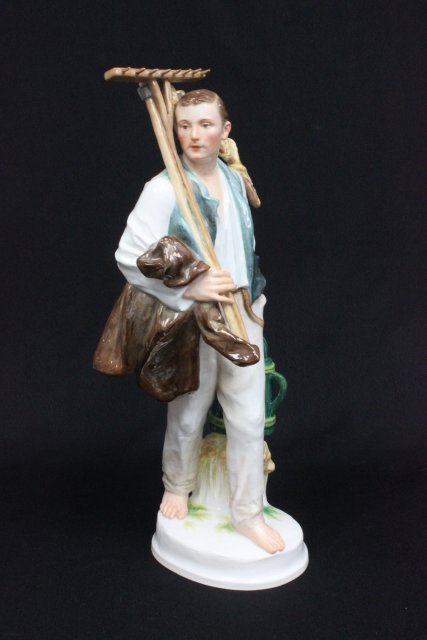 19thc. Meissen "Farmer Carrying Rake & Pail": 19thc. Meissen porcelain "Farmer Carrying Rake & Pail." Blue cross sword mark. Approx. 14.75" H. The property of a NYC gentleman's 20 year collection. Possible professional restorations.