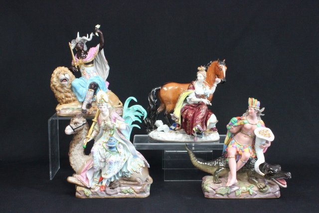 19th c. Meissen group of "The Four Continents": 1- America- depicts an "Indian Holding Horn of Plenty" & "A Parrot Resting on an Alligator", approx. 11.5" H. 1- Africa- "Nubian Prince with Elephant Hat Seated on a Lion", approx. 10" H. 1- Asia- "Qu