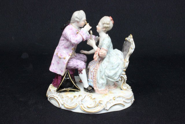 19th c. Meissen porcelain figure: "Seated Gentleman Holding Eyeglasses & Lady Holding Fan", incised mark D174,132, blue cross sword mark. Approx. 5" H x 4.5" across. The property of a NYC gentleman's 20 year collection. Possible profe