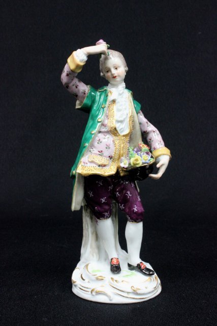 19th c. Meissen porcelain figurine: "Man with Hat of Flowers", blue cross sword mark, 1770-1910. Approx. 6.75" H. The property of a NYC gentleman's 20 year collection. Possible professional restorations.