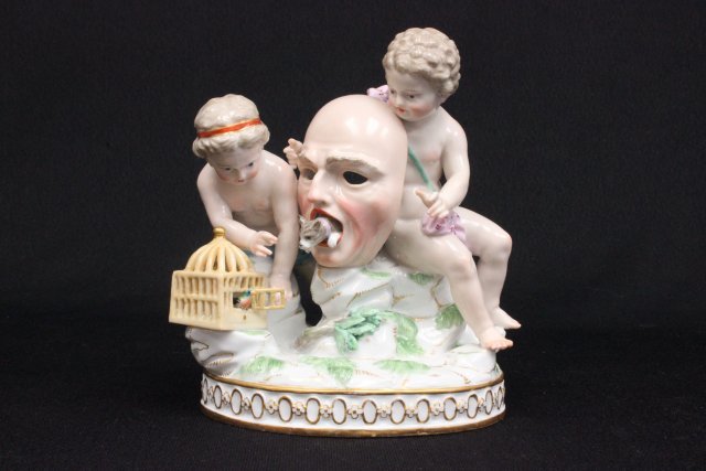 19th c. Meissen porcelain grouping: "2 Children with Dog Coming out of Mask","Birds Coming out of Cage", blue cross sword mark. Approx. 6" H x 5" W. The property of a NYC gentleman's 20 year collection. Possible professional restoration