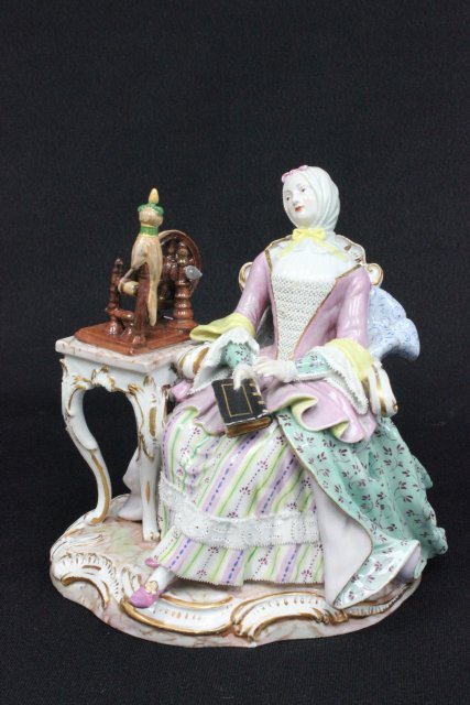 19th c. Meissen porcelain figurine: "Seated Lady with Book by Sewing Machine", "W" mark, incised mark 2685, blue cross sword mark. Approx. 6" H x 5.5" W. The property of a NYC gentleman's 20 year collection. Possible professional restor